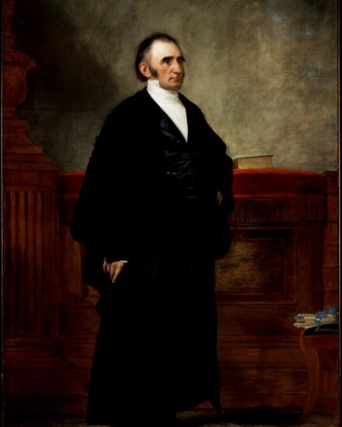full standing portrait of a man in vintage dress