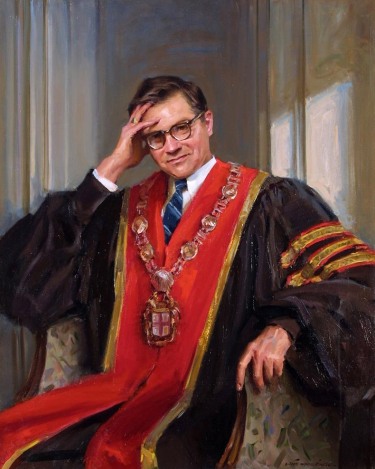 seated portrait of a man in doctoral robes